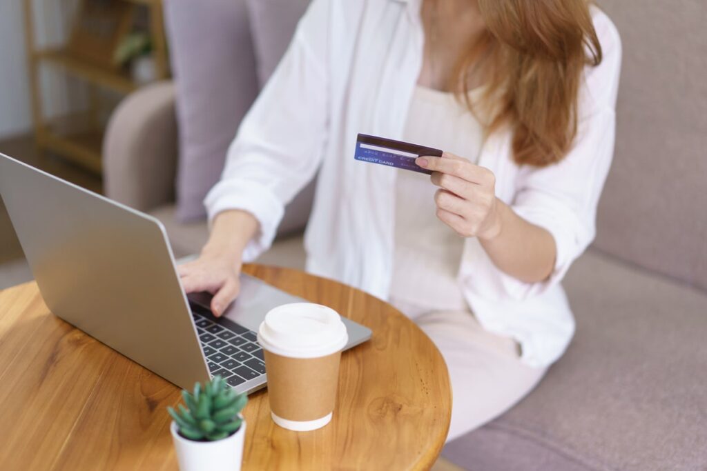 Redeeming points from a credit card to book a flight.